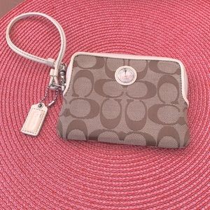 Cute COACH Khaki signature wristlet.